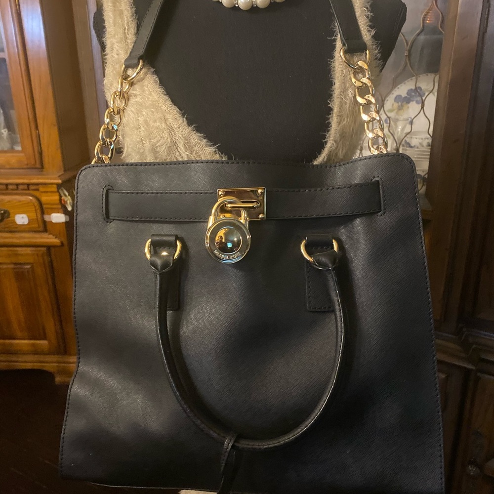 Michael Kors black shoulder bag.